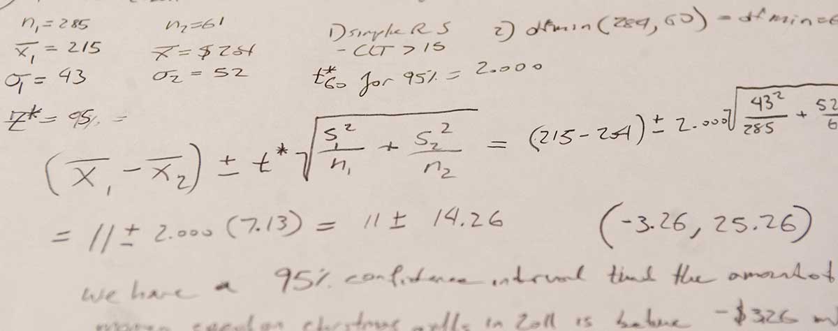 math problems scrawled on a piece of paper